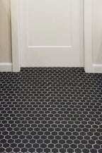 Black marble hexagon tiled bathroom floor