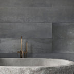 Black porcelain tile bathroom wall