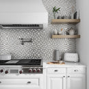 Stylish shining metallic and glass kitchen backsplash