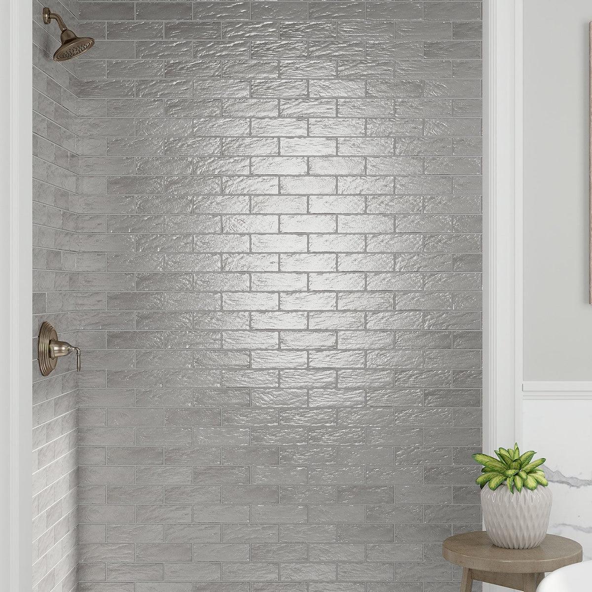 gray ceramic subway tile shower wall