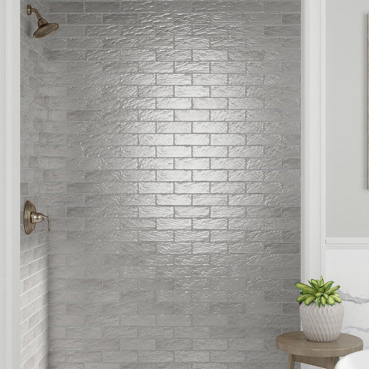 gray ceramic subway tile shower wall