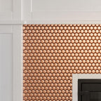 Metallic Bronze Penny Round Tile Fireplace Close-up