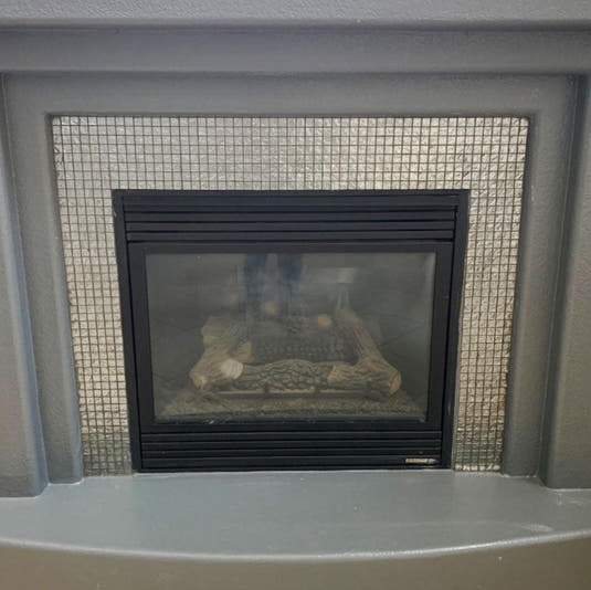 Silver Mercury Glass Fireplace Surround from Tile Club
