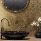 Molten Gold Brick Ceramic Subway Tile for a Herringbone Backsplash