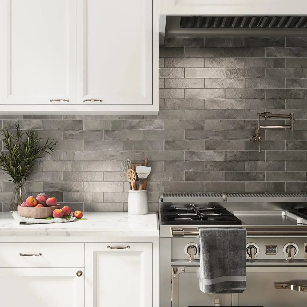 White and silver kitchen backsplash with Molten Pewter Brick Ceramic Subway Tile