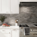 White and silver kitchen backsplash with Molten Pewter Brick Ceramic Subway Tile