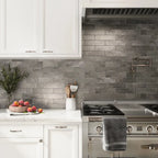 White and silver kitchen backsplash with Molten Pewter Brick Ceramic Subway Tile