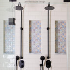 White ceramic subway tile shower with colorful Moroccan tile niche decor