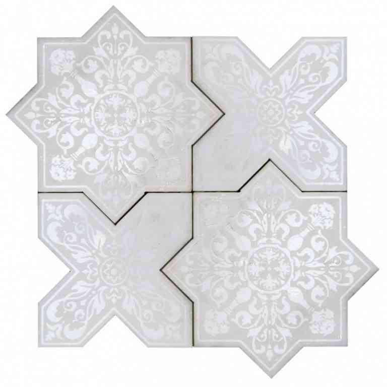 white marble star and cross tile backsplash