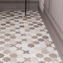 Bathroom floor with Moroccan tiles in a star and cross pattern