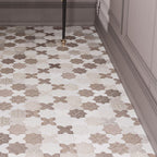 Bathroom floor with Moroccan tiles in a star and cross pattern