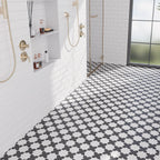 Black and White patterened floor with etched Moroccan star and cross tiles