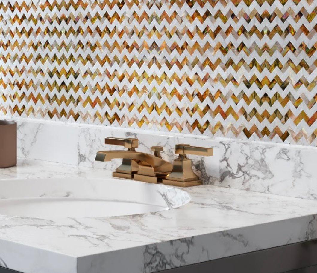 Mother Of Pearl Divine Herringbone Mosaic Tile Backsplash with a Marble Bathroom Countertop