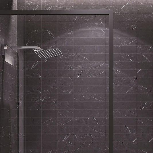 Modern shower with black marble subway tile
