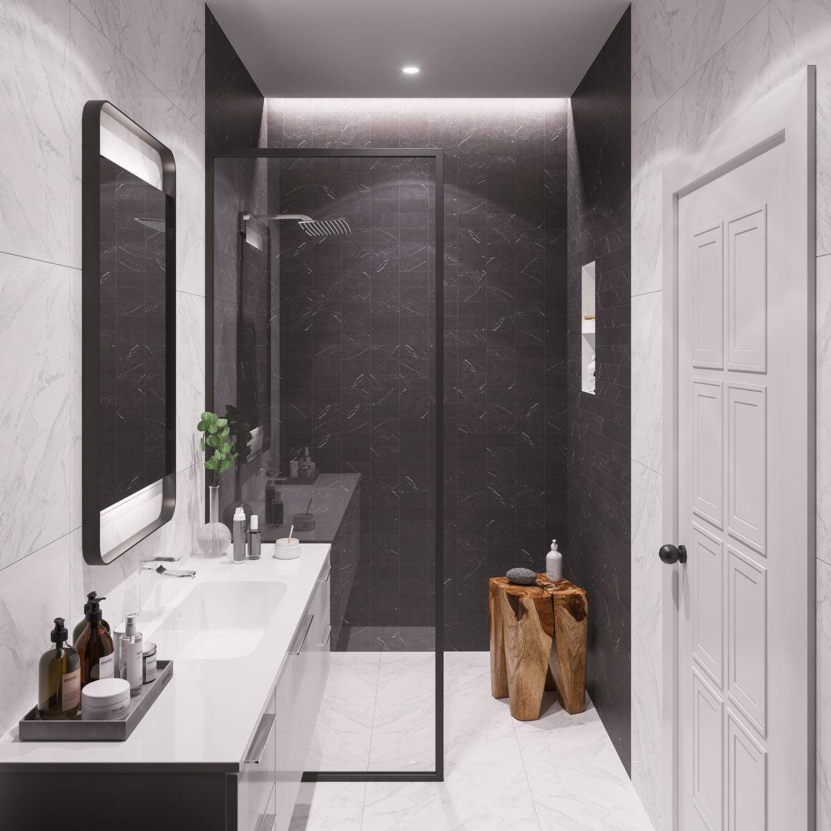 Black and white tuxedo bathroom with Nero Marquina honed black marble subway tile