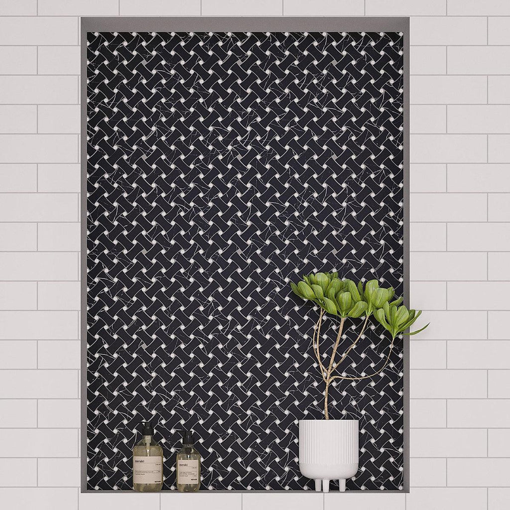 Black marble basketweave shower niche tile