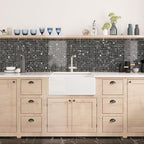 Rustic kitchen with black marble tile backsplash