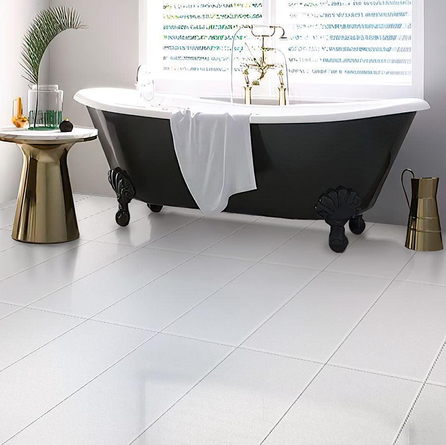 Black Bathtub & Golden Toilet Table on the Neutral Blanco Tile Floor