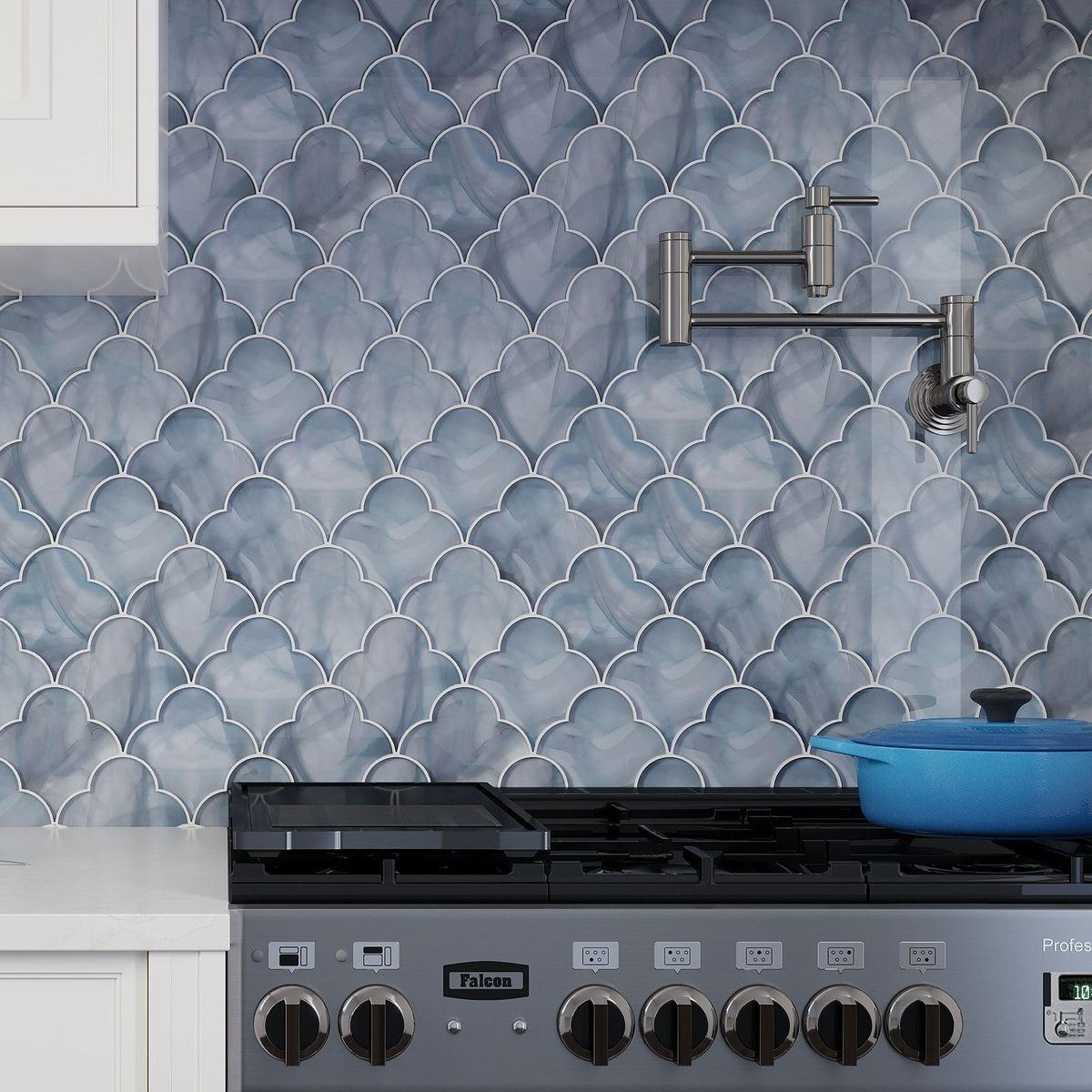 blue glass mosaic tile kitchen backsplash behind stove