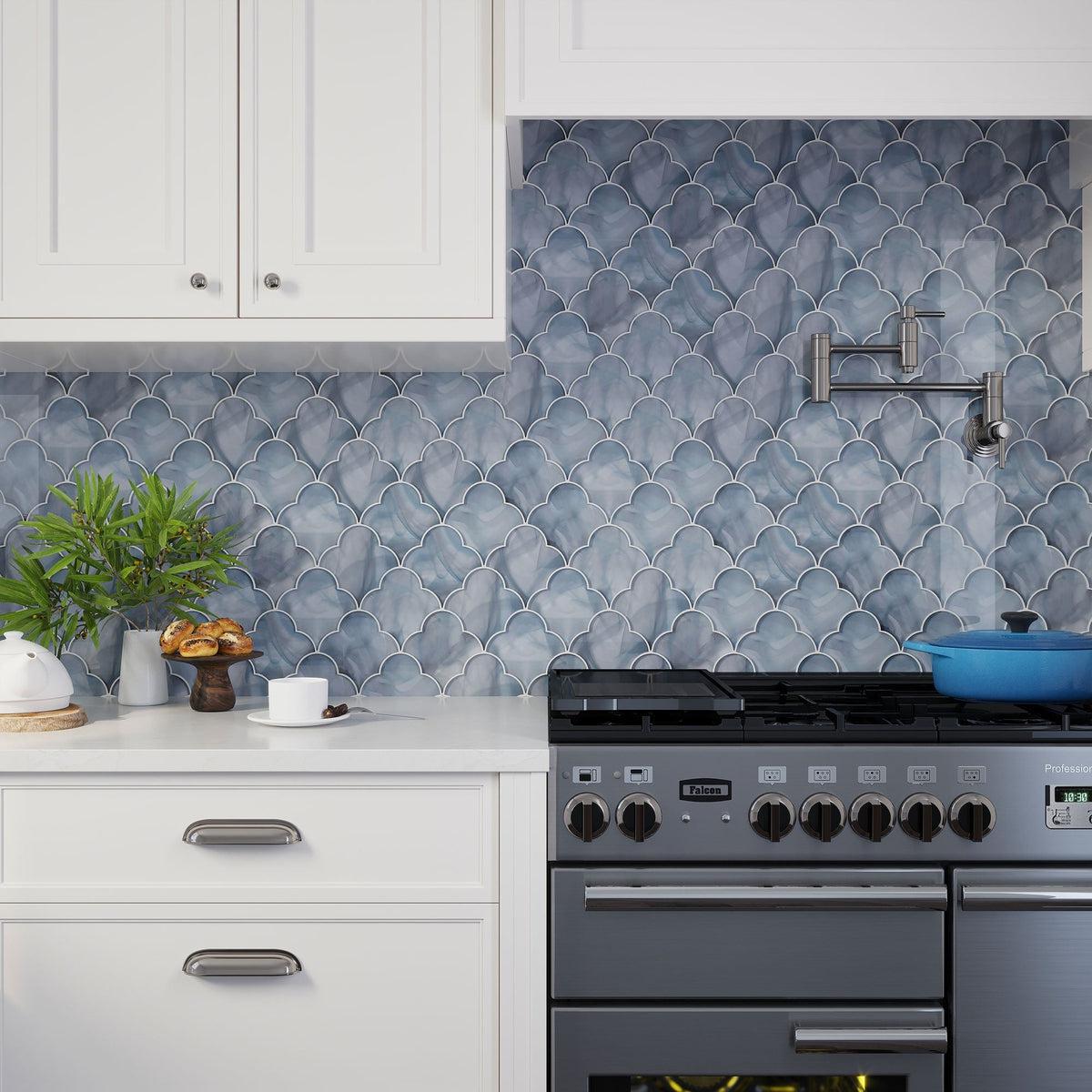 blue glass mosaic tile kitchen backsplash with white kitchen cabinets