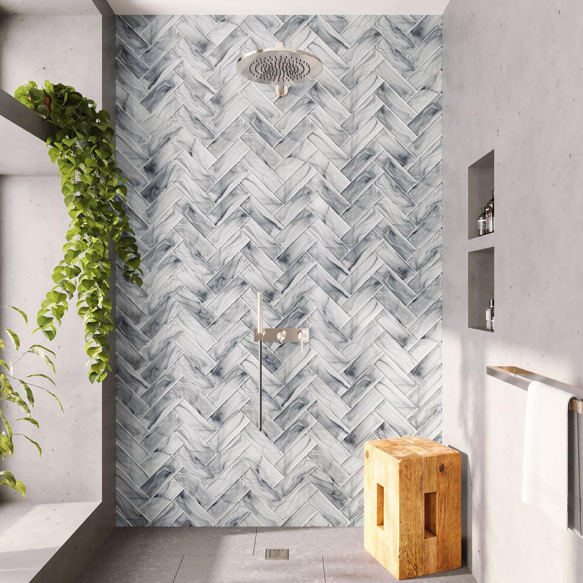 Hand poured glass tile herringbone shower wall