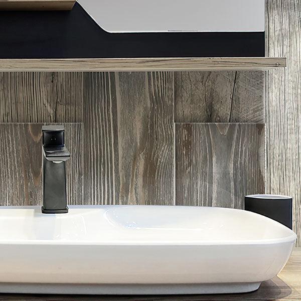 White Bathroom Sink in Background of Painted Wood Blue Wall