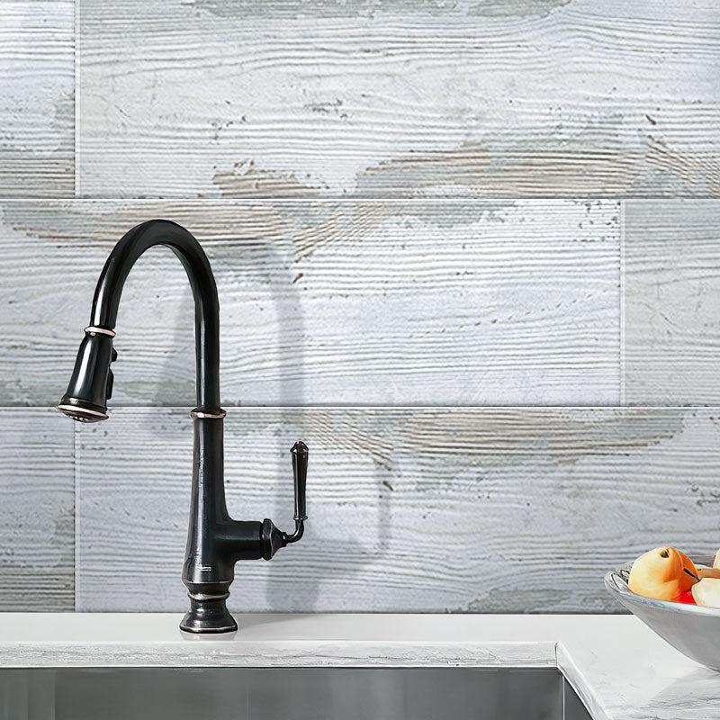 Black Kitchen Faucet on Painted Wood White Wall Background