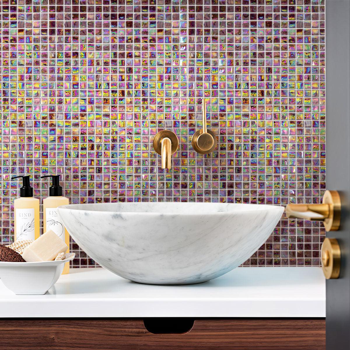 The bathroom shines with Pearlescent Oil Slick Squares Glass Tile accents