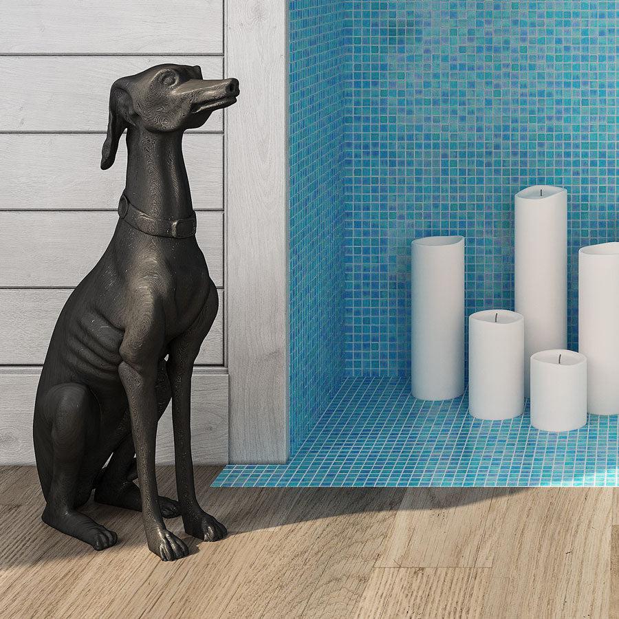 Dog Statue in Front of Pearly Aqua Blue Squares Glass Pool Tile Decorative Fireplace