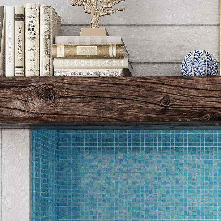 Old Wood Bookshelf above Pearly Aqua Blue Squares Glass Pool Tile Fireplace