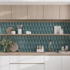 Textured leaf inspired ceramic backsplash in bold jade green