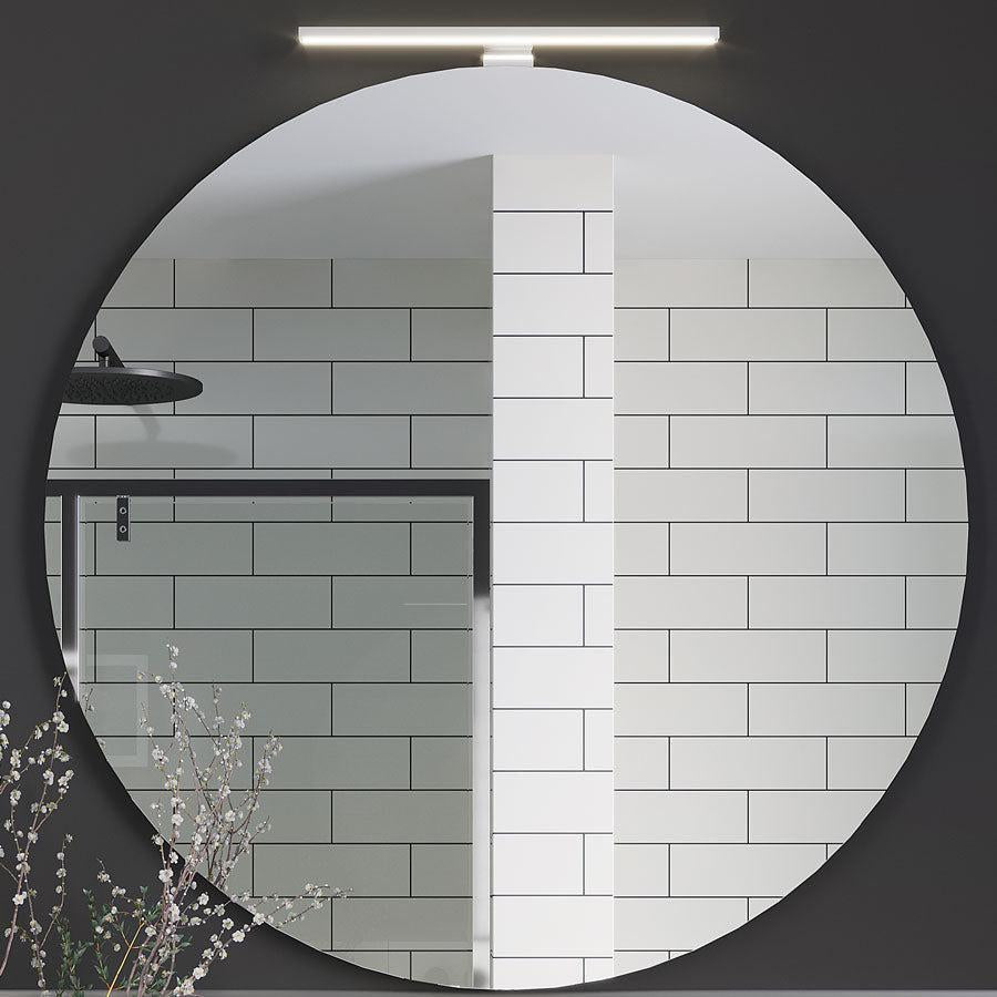 Round Bathroom Mirror on The Wall of Polished White Ceramic Subway Wall Tile 4x12