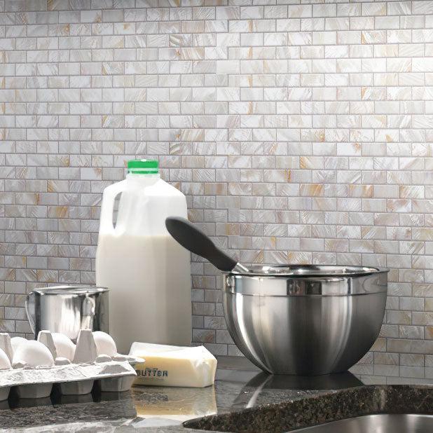Milk & Butter on Bacground of Pure White Mother of Pearl Brick Mosaic Tile Wall