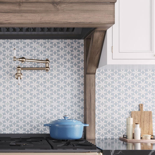 Wood kitchen range with white cabinets and blue and white flower pattern marble backsplash tile