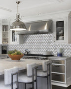 Modern Kitchen with Brushed Metal Appliances and Drawers and Sand Valley And Thassos Octagon Marble Mosaic Tile Backsplash