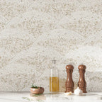 Wave inspired beige and gold mosaic tile backsplash