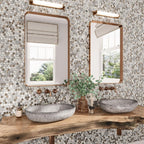 Modern organic bathroom with gray and metallic hexagon glass tiles with a live edge wood countertop