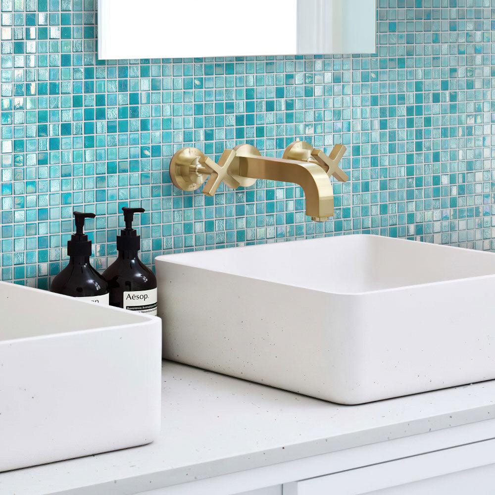 The bathroom features Sea Foam Mixed Squares Glass Tile accents