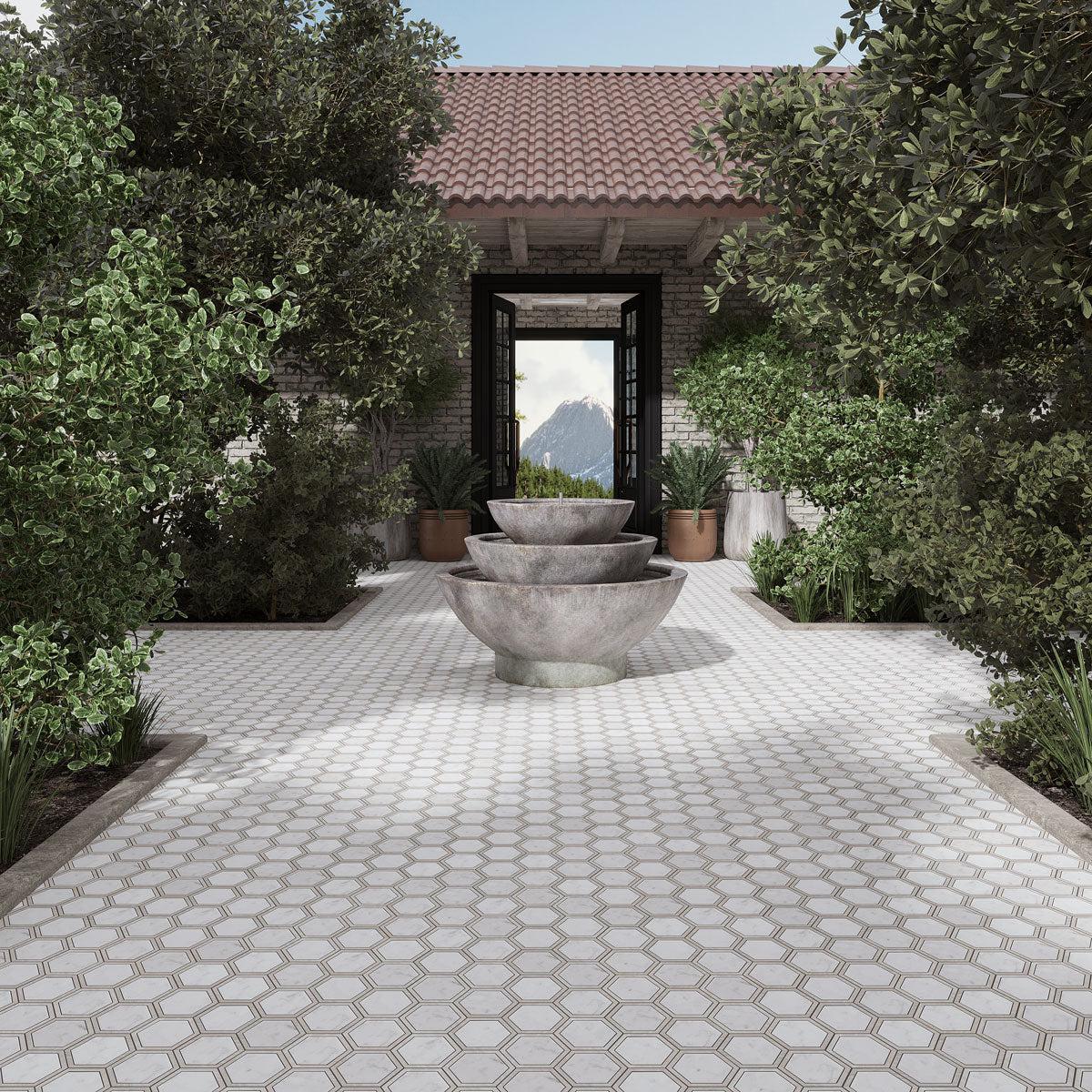 Two tone marble hexagon tile for an outdoor courtyard