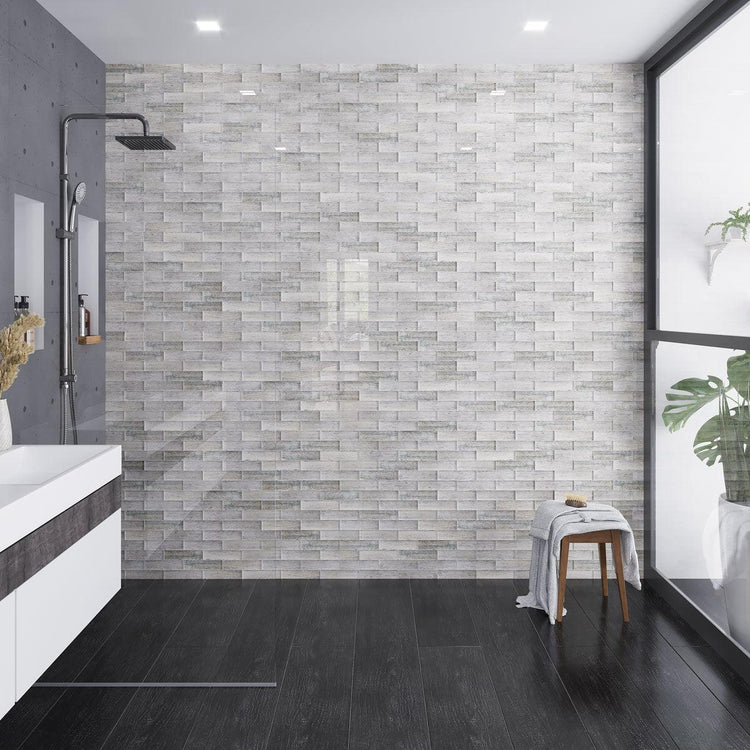 Gray and black modern bathroom with a curbless shower and wood look porcelain tile floors