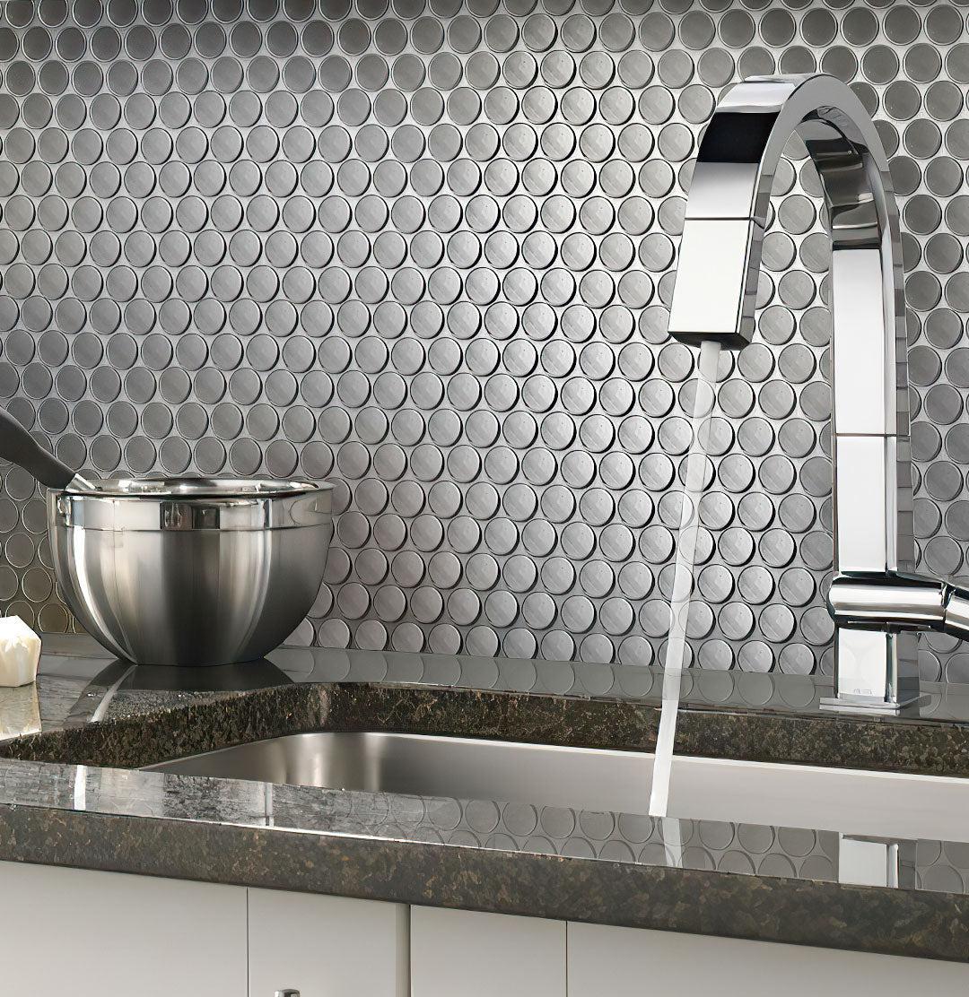Metal penny round tile kitchen backsplash close-up