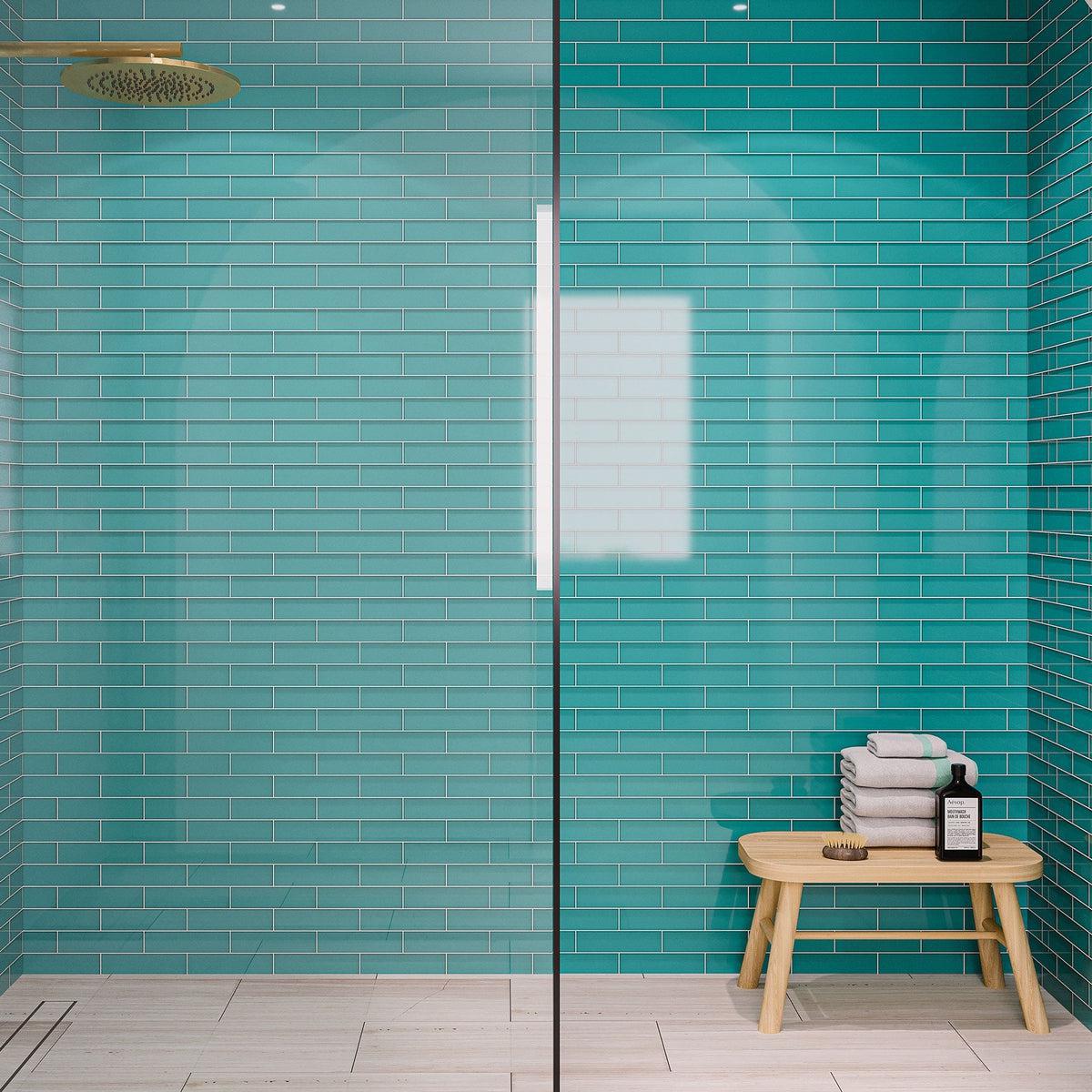 Blue glass tile standing shower