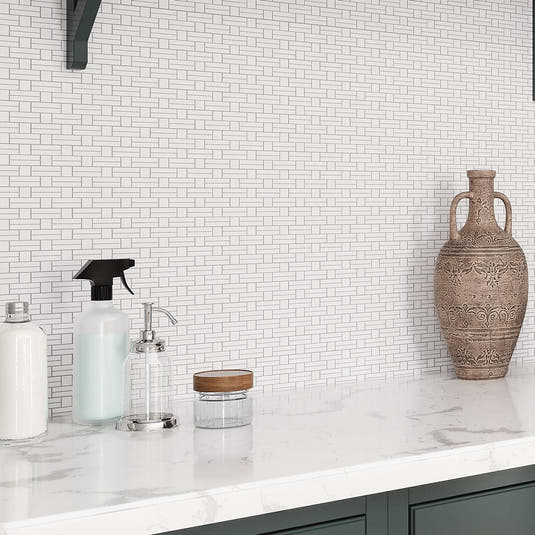 Minimal geometric tile backsplash for a contemporary laundry room