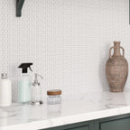 Minimal geometric tile backsplash for a contemporary laundry room