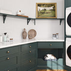 Green and white laundry room with geometric white marble mosaic tile backsplash