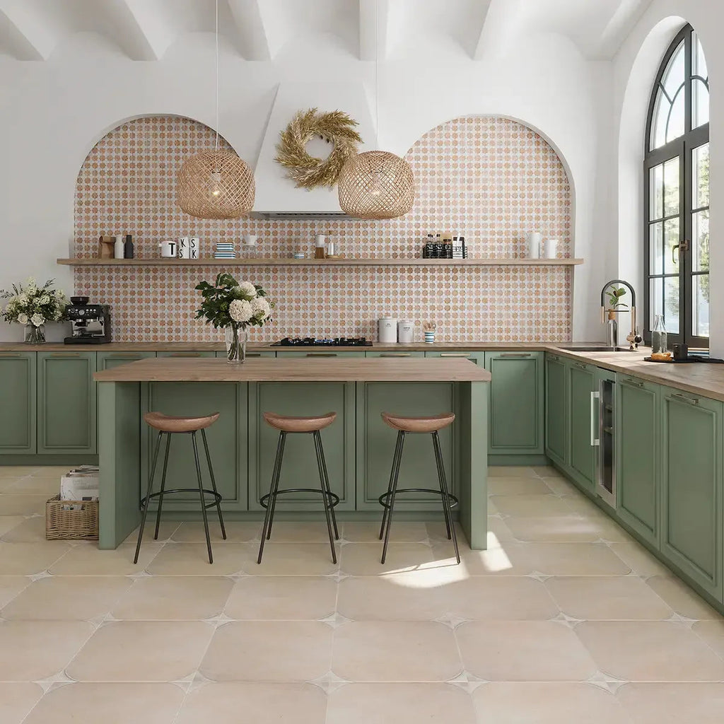 Beige and green kitchen design with textured backsplash and terracotta square flooring