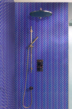 Shower with Cobalt Blue Herringbone Glass Tile walls