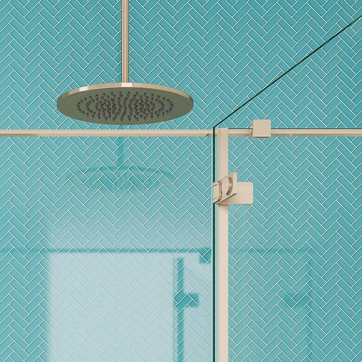 Golden Shower Head with Turquoise Herringbone Glass Tile Wall