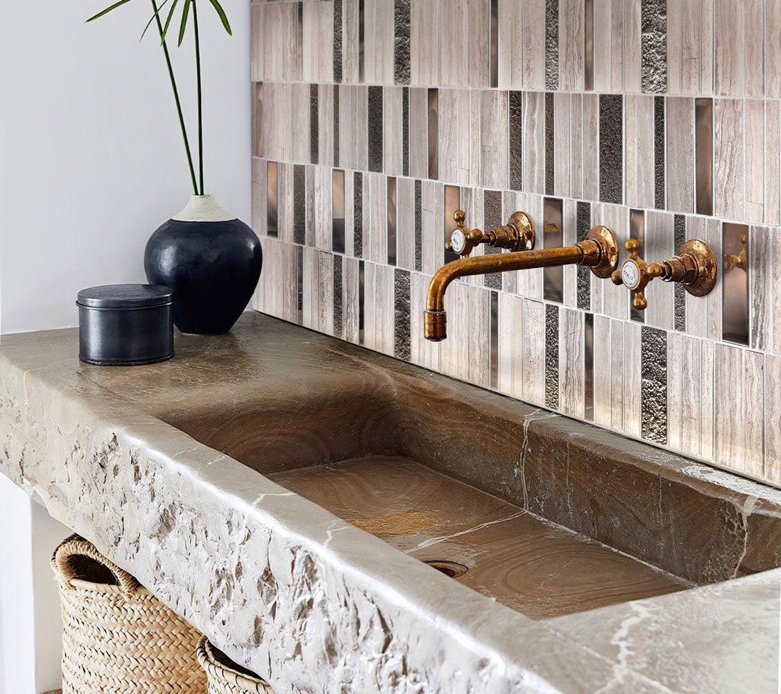 Villa Rapids Gray Marble Glass Mosaic Tile with metallic finishes and a natural stone sink