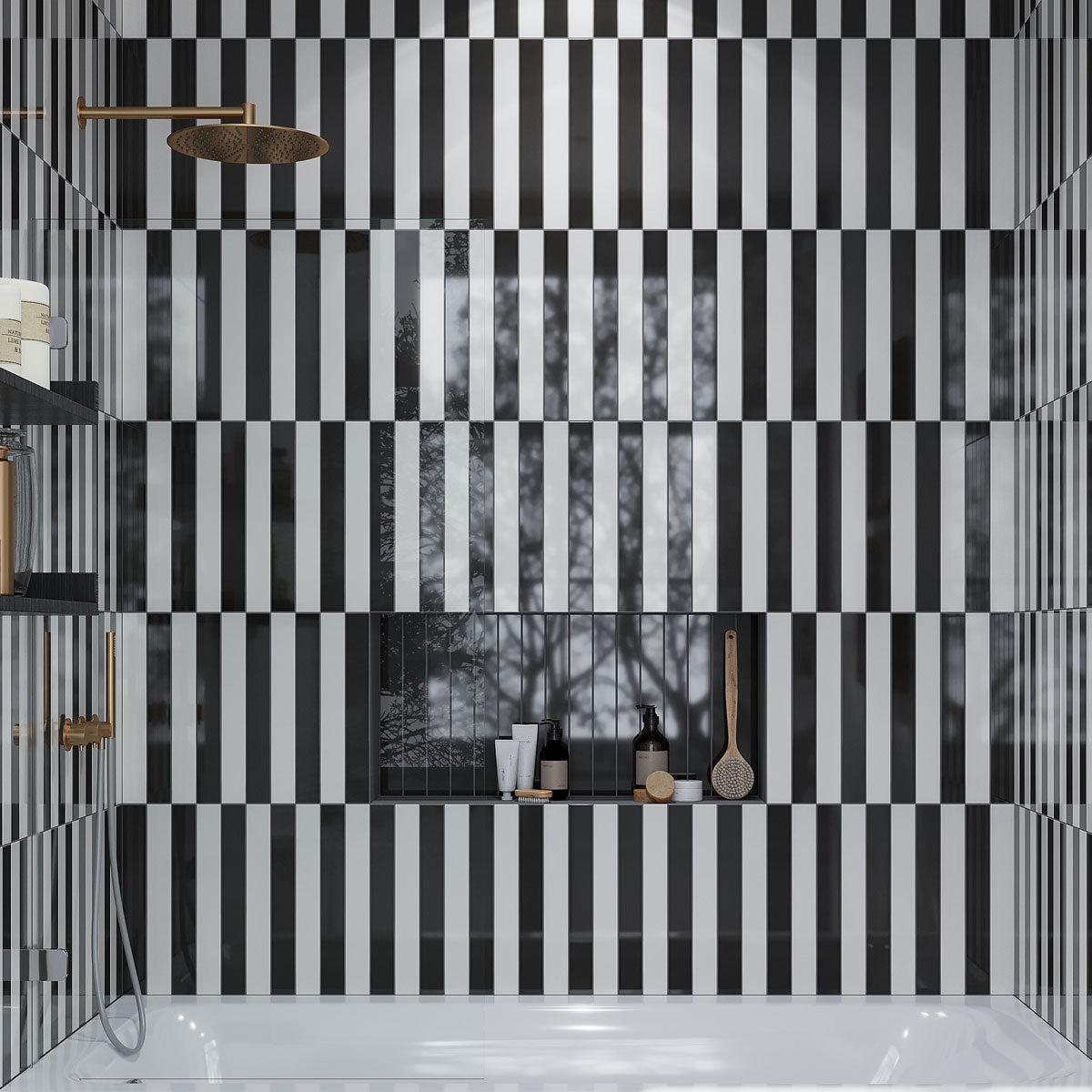 Black and white subway tile shower with a striped pattern